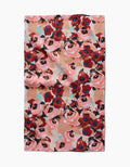 The Lucia Tea Towel by Ania Zwara Art features a vibrant abstract floral design in red, pink, and blue on a light background, crafted with Geoweave™ fabric for excellent absorbency and durability.