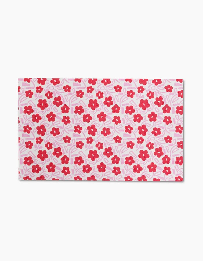 The Happy Hemera Magic Wand features a pattern of red and pink flowers with light purple leaves on a white background, crafted from recycled materials.