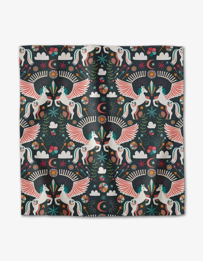 “Magical Moments” by Jessica Swift features a vibrant pattern of winged unicorns, rainbows, clouds, mushrooms, hearts, and geometric shapes on a dark background—ideal for eco-friendly dinner napkins made from recycled materials.