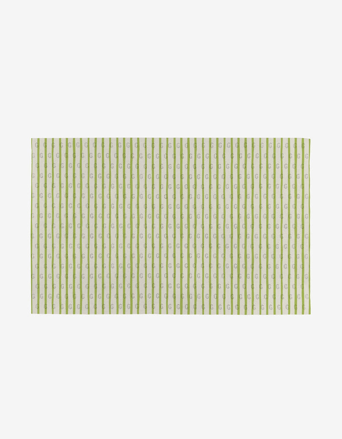 Mindfulnice’s Mindful Mix is a rectangular, eco-friendly fabric with vertical green and white stripes featuring a repeating lowercase g on the white stripes, all set against a plain white background.