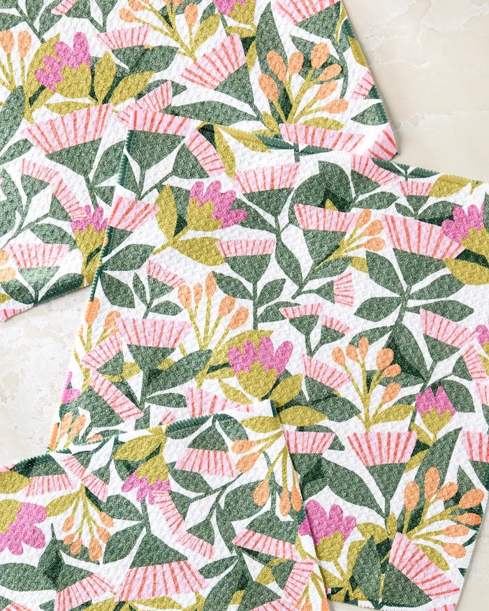 Add a touch of charm to your kitchen with Lisa Nelson's Moxie Mauve napkins, featuring floral designs that pair perfectly with your favorite recycled dishcloths.