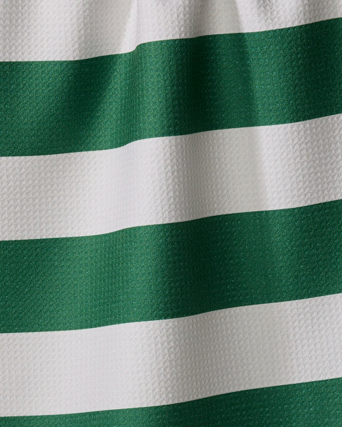 Close-up of The Modern Dad’s Mr. Day On The Green kitchen towel, made from recycled materials with textured horizontal green and white stripes and soft folds.