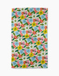 The New Mercies tea towel by Susan Heid features a colorful floral pattern with yellow, blue, orange, and pink flowers and green leaves on white, made from quick-drying recycled materials.