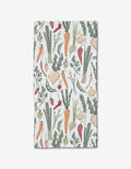 The Organic Vegetable kitchen bar towel by Hufton Studio features hand-drawn veggies—carrots, leeks, turnips, garlic, radishes, and peas—on a white background and is made with absorbent Geoweave fabric.