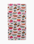 The Amy MacCready Orla Bar Towel showcases colorful illustrated pies, slices, and baking dishes in pink, orange, green, and blue on white Geoweave fabric for absorbency.