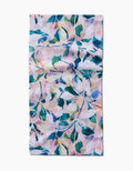 The Rachel Parker Painted Foliage Bar Towel features a colorful floral pattern with green, pink, and blue leaves on white Geoweave fabric, shown against a plain white background.