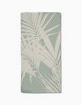 The Geometry Palm Breeze Bar Towel is a light sage green towel with textured Geoweave fabric and a beige palm leaf pattern, shown flat on a white background.