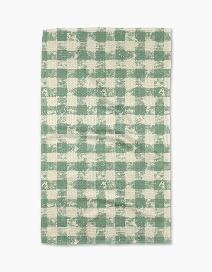 Patch Mint by Geometry is a rectangular tea towel with a green and white checkered, distressed texture, made from recycled materials for eco-friendly appeal.