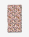 The Elisabeth Wing Peach Tree bar towel features a whimsical pattern of owls, rabbits, and birds among branches on a light pink background, crafted from recycled materials in soft pink, beige, brown, and blue tones.