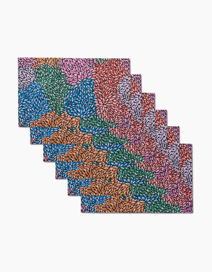 A series of overlapping rectangular Petal Pen tiles by Rachel Parker, each covered in colorful, leaf-like patterns—blue, orange, green, pink, and purple—arranged diagonally on a white background.
