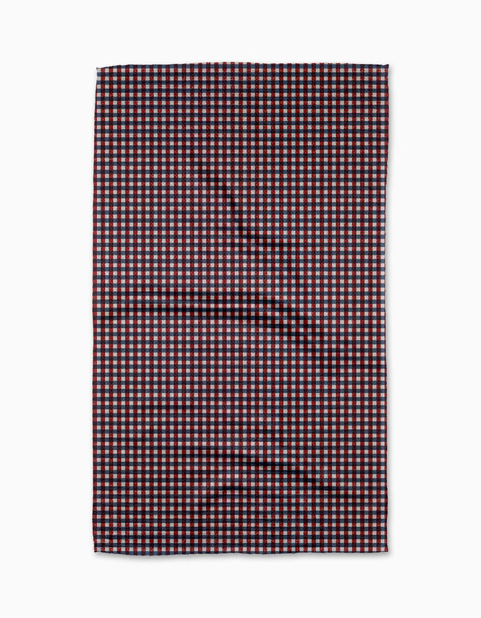 Geometrys Picnic Parade is a rectangular tea towel with a small maroon, white, and blue checkered pattern, crafted from durable Geoweave fabric and shown flat on a white background.