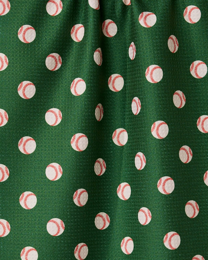 The Play Ball kitchen towel by GEOMETRY features green fabric adorned with white baseballs and red stitching, is slightly gathered at the top, and crafted from recycled materials.