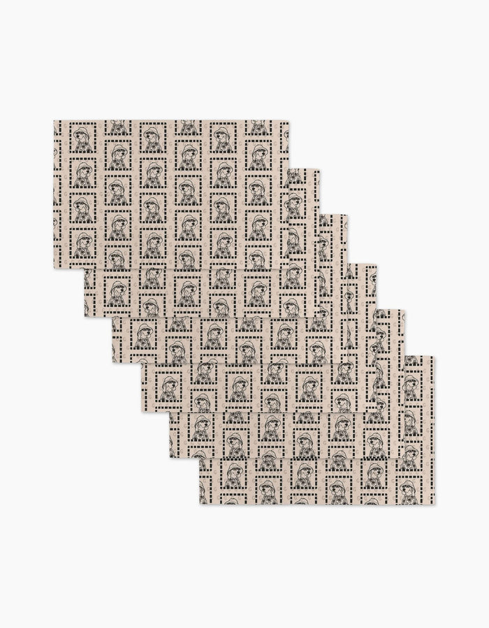 Sheets of Ready For Summer Doggy by Geometry, featuring black and white dog portraits in a staggered pattern—an economical, eco-friendly alternative to Not Paper Towels.
