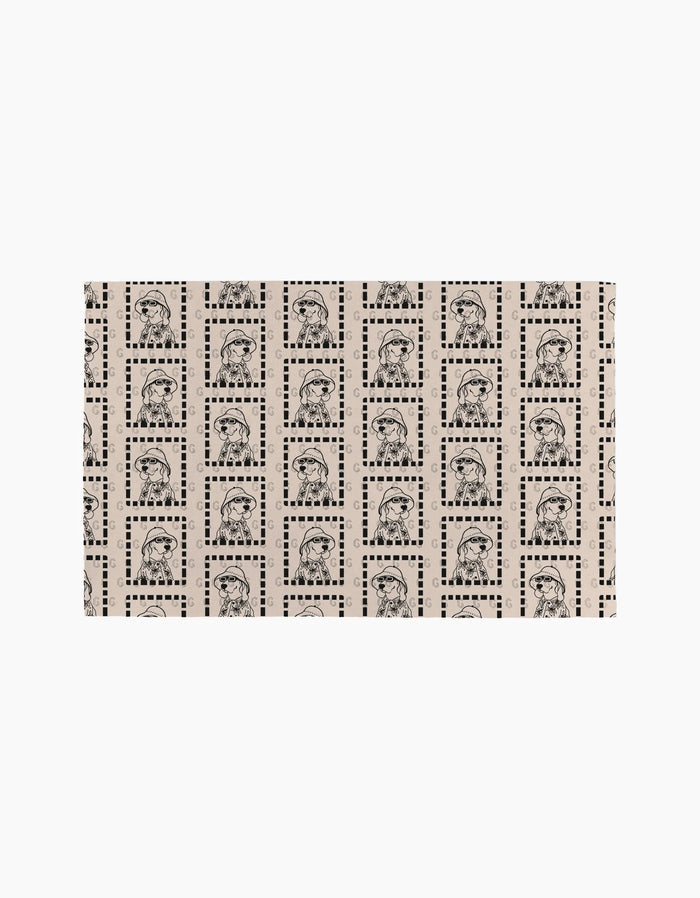 A sheet of Geometry’s “Ready For Summer Doggy” vintage-style stamps, each featuring a hat-wearing pup illustration with decorative borders on beige—an economical, eco-friendly option made from post-consumer recycled materials.
