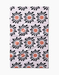 The Realm Refillery tea towel features a white background with rows of black flowers accented by red-orange centers. Made from eco-friendly Geoweave fabric, this stylish and sustainable design comes from Realm Refillery.