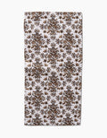 The Rustic Lacy Tile Natural by Hufton Studio is a rectangular white recycled kitchen towel with a repeating brown and gold botanical pattern of symmetrical tree motifs arranged in rows.