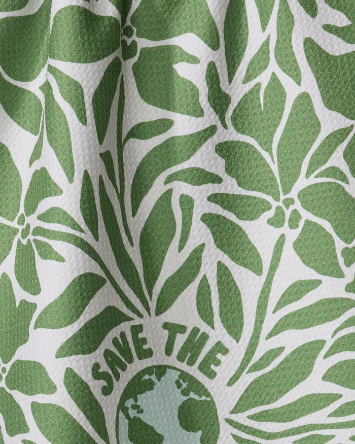 The Save the Planet tea towel by Sweet Simple Vegan features a green floral pattern and Earth illustration with "SAVE THE" above, all on textured white fabric made from recycled materials for an eco-friendly touch.