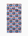 The Seventies Retro Flowers bar towel by Claire Iglesias features a repeating blue, red, and white floral pattern with stylized blooms on a white Geoweave fabric background.