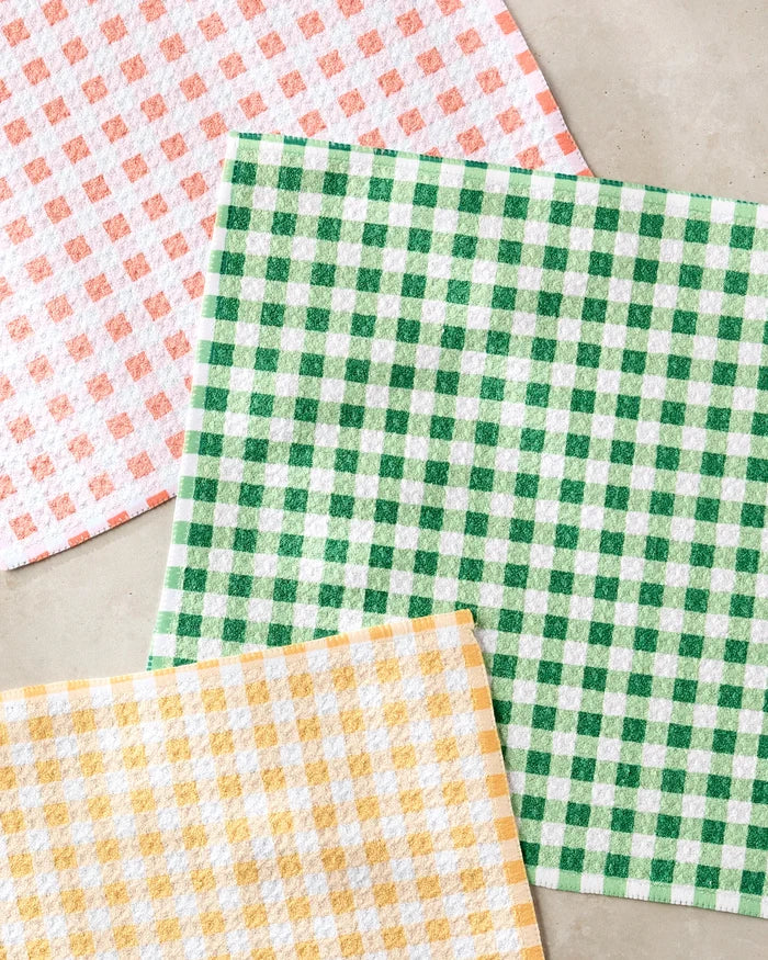 The Danelys Sidron Spring Plaid set includes three super-absorbent dish towels in red-white, green-white, and yellow-white patterns—ideal for stylishly handling kitchen messes.