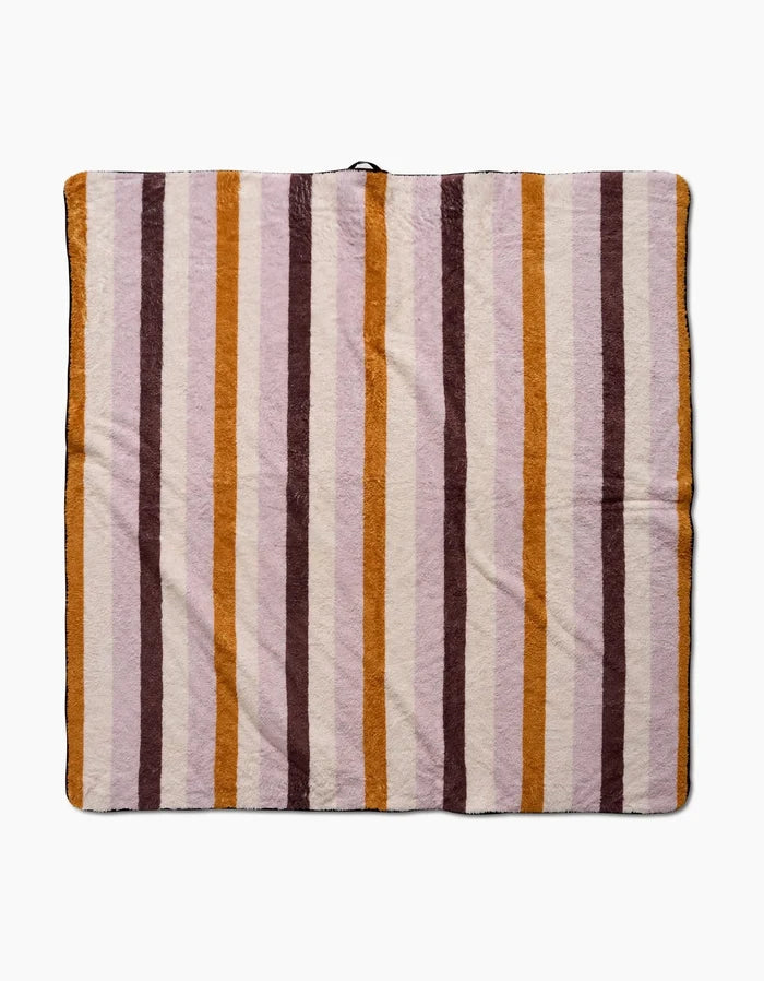 The Megan Roy Squirrels Stripe dog towel features a soft, ultra-absorbent square design with vertical brown, orange, and beige stripes on white, shown laid flat on a plain white surface.