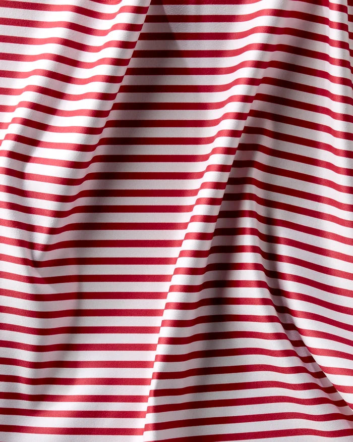 Stars And Stripes by Mindfulnice features red and white horizontal Geosuede stripes with soft folds and wavy shadows—an elegant, recycled fabric perfect for dinner napkin sets.