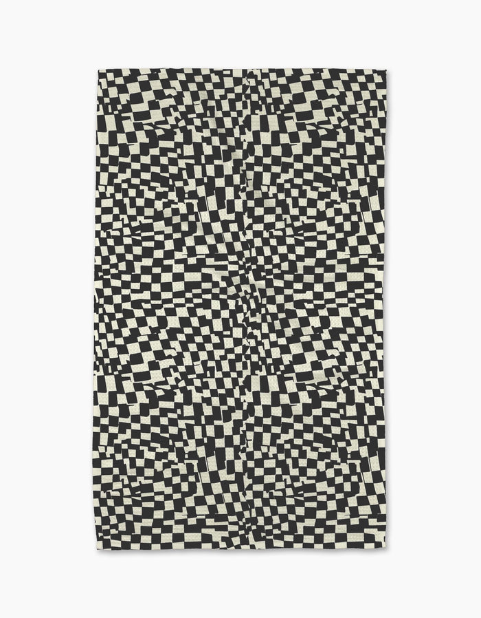 The Static rug by Geometry features a black and white distorted checkerboard pattern for an optical illusion effect—pair it with a modern, eco-friendly kitchen towel for a coordinated look.