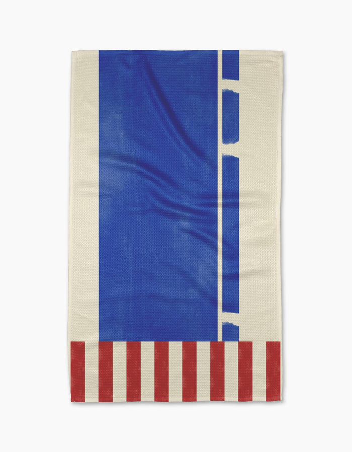 The Geometry Striped Heart Blue Tea Towel features a bold blue rectangle, vertical blue shapes, and red and white striped accents on cream Geoweave fabric for ultra-absorbency.