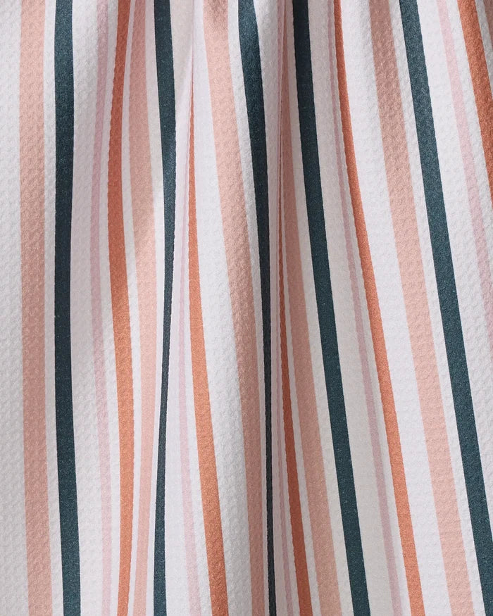 Close-up of the Stripes For Days tea towel by Charlie Rowan Designs, made from recycled materials with vertical peach, dark green, and white stripes, soft texture, and gentle folds.