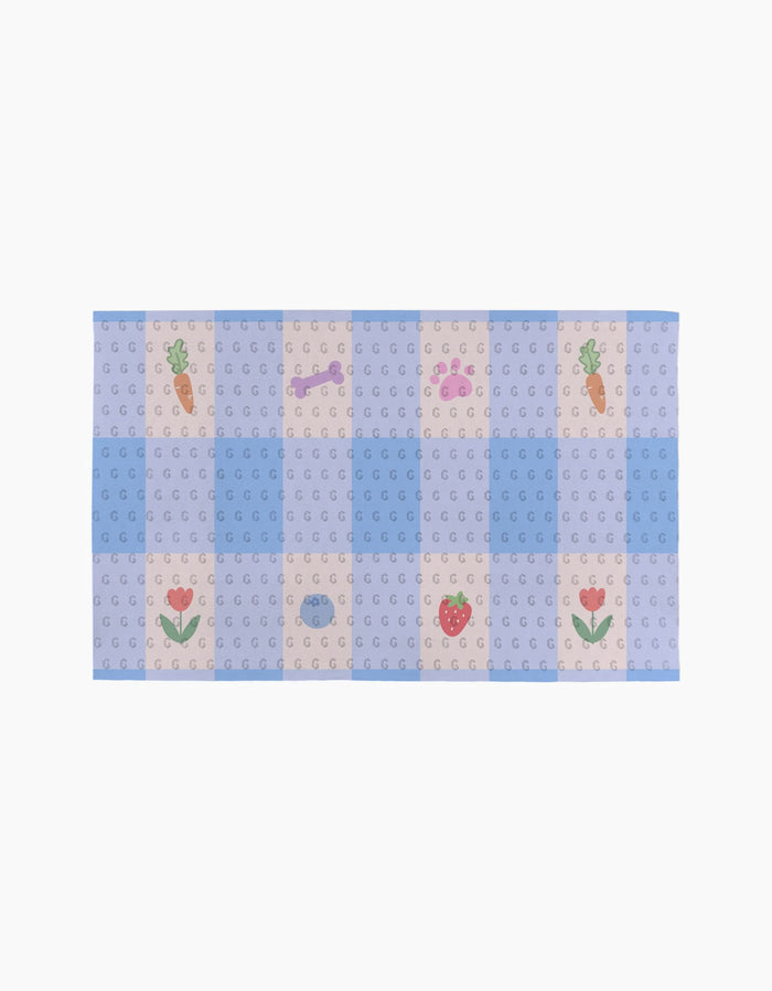 Summer Picnic Dreams by Letters By Shells is a rectangular pastel mat with a blue and beige checkered pattern, featuring small carrot, tulip, strawberry, dog bone, and fish illustrations—ideal for your eco-friendly or reusable Not Paper Towels.