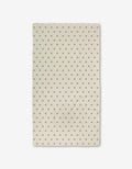 The Sunshine Glow by Danelys Sidron is a cream-colored rectangular cloth with evenly spaced green polka dots, made from recycled materials, displayed flat against a white background.