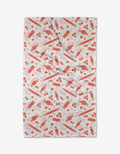 The Sweet Love of Mine tea towel by Charlie Rowan Designs features a red kitchen utensil pattern on white Geoweave fabric. The rectangular towel is shown laid flat with slight creases across its surface.