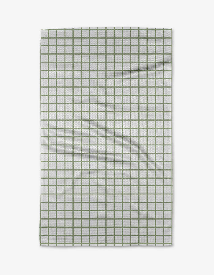 The Kailee Wright Sweet Mint towel is a white Geoweave cloth with a green grid pattern, showing a few visible folds and wrinkles.