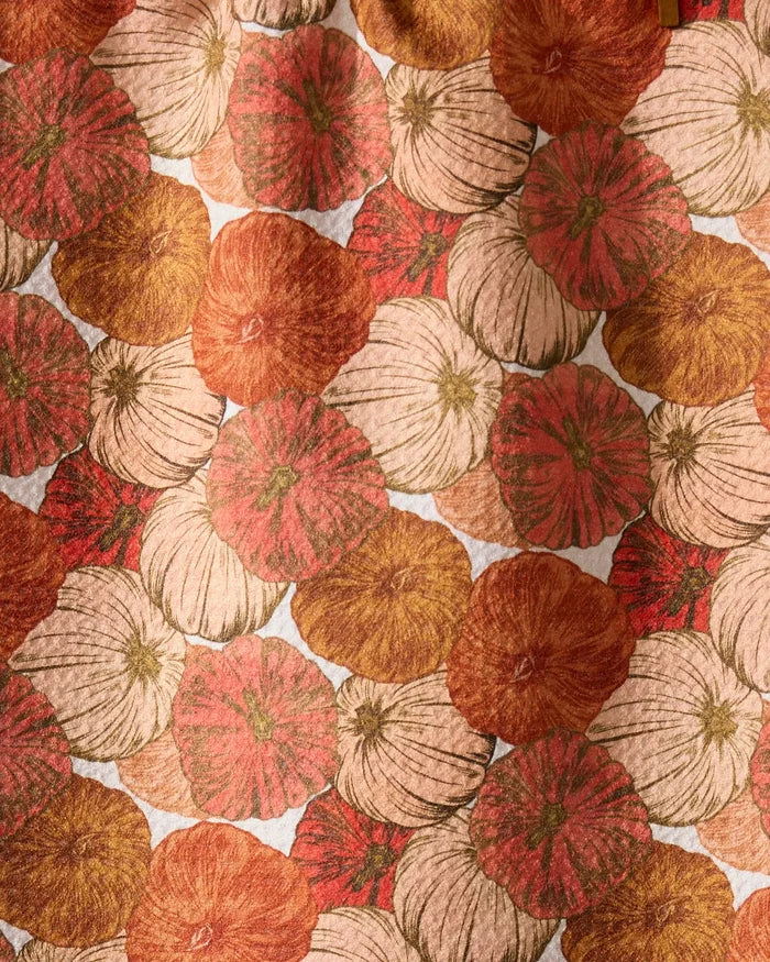 Geometry’s Tendril towel features a harvest-inspired pattern of overlapping orange, cream, and brown pumpkins with textured lines, creating an autumn look thats perfect for this ultra-absorbent towel.