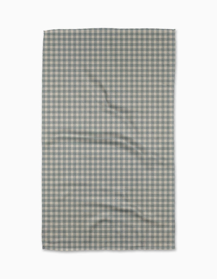 The Jenny Keller Tidepool Check is a rectangular recycled kitchen towel featuring a small blue and white gingham checkered pattern, slightly wrinkled and laid flat on a white background.