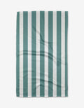 The BetterDays Trim Tea Towel is rectangular with alternating vertical stripes of teal green and white. Displayed flat on a white background, it has a subtle waffle texture, visible creases, and is made from post-consumer recycled materials.