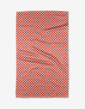 The Kayla Ann Valentines Day Gingham tea towel features a red and white checkerboard pattern and is shown slightly wrinkled on a white background.