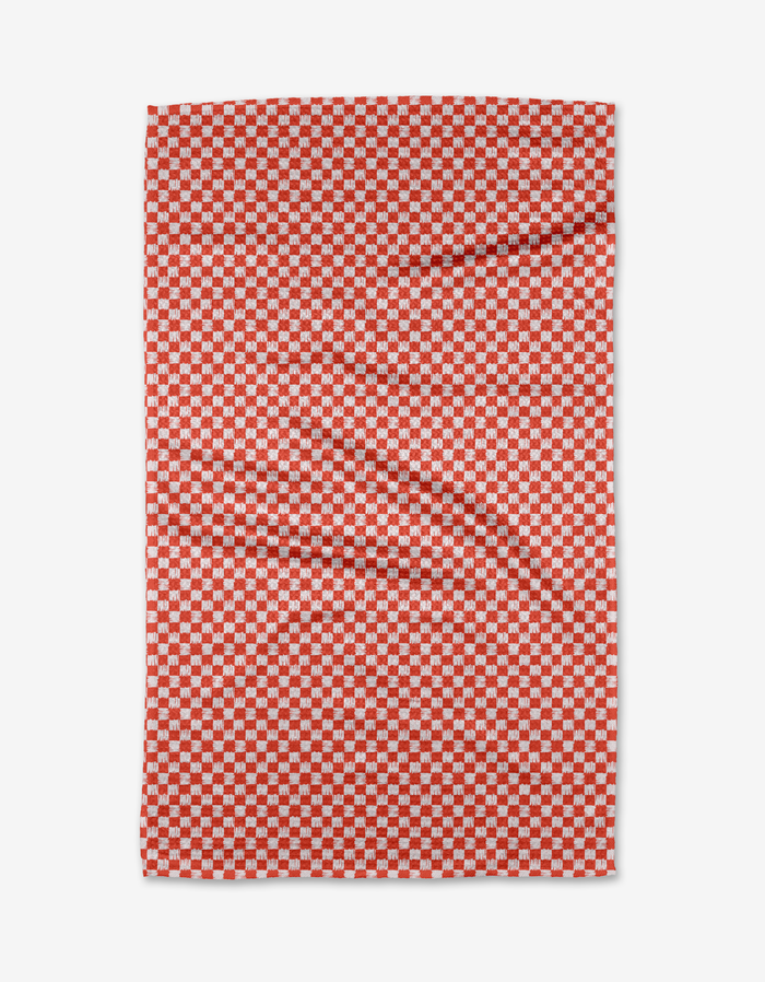 The Kayla Ann Valentines Day Gingham tea towel features a red and white checkerboard pattern and is shown slightly wrinkled on a white background.