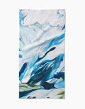 The Where He Laid To Go bar towel by Kelly Peters features blue, teal, green, and white brushstroke patterns resembling mountains or waves on Geoweave fabric, shown flat on a white background.