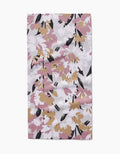 The Wilderness Floral Bar Towel by Toboggan Avenue features an abstract, colorful floral pattern on a light background, crafted from recycled materials for an eco-friendly touch.