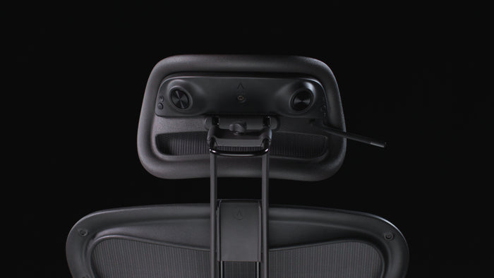 Rear view of the Atlas Aeron Chair Headrest Bluetooth Speaker installed on a Herman Miller Aeron chair